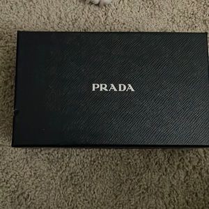 Prada wallet for sale. Slightly used logo but in great condition almost … real!